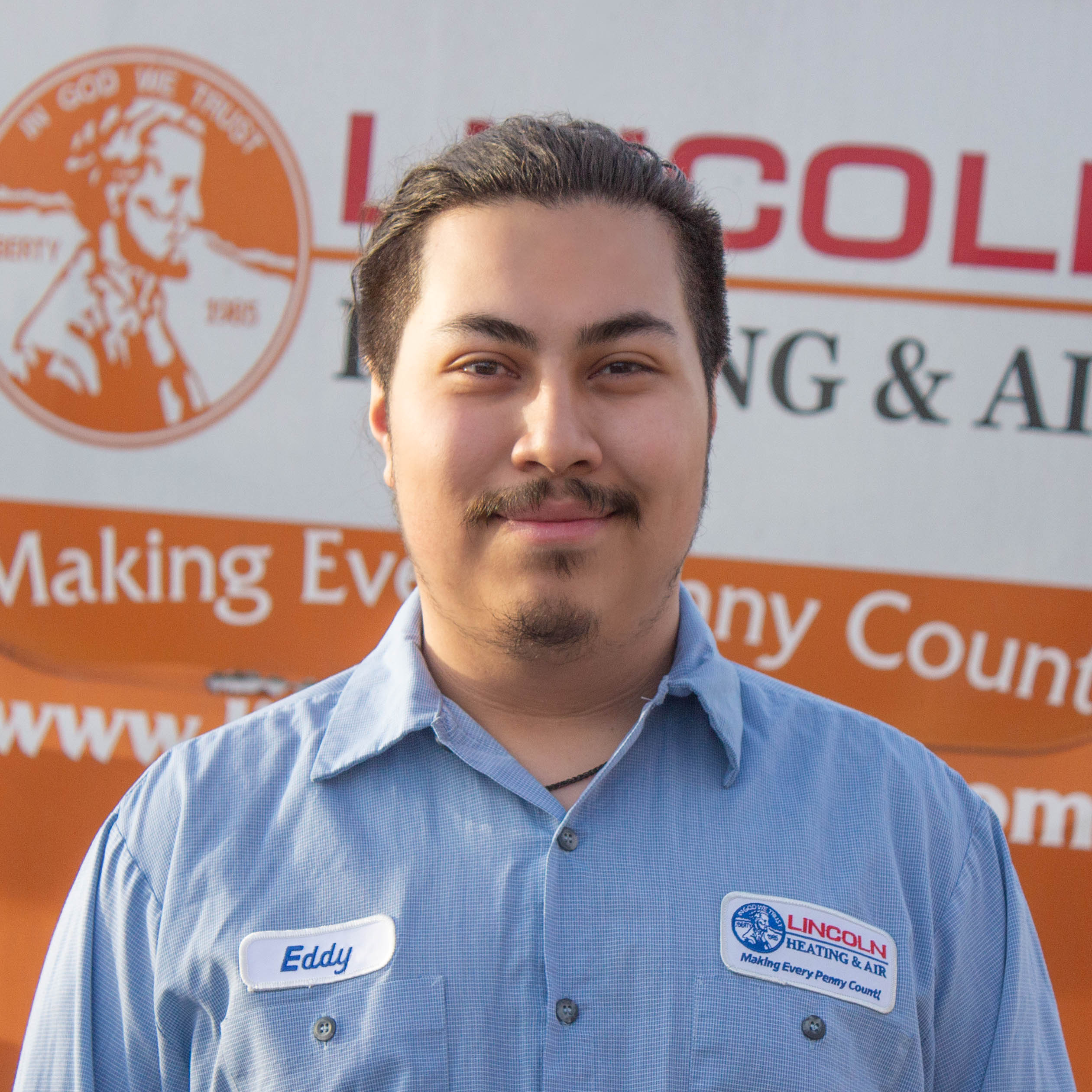 Team members of Lincoln Heating & Air, showcasing family-oriented values and commitment to customer service.